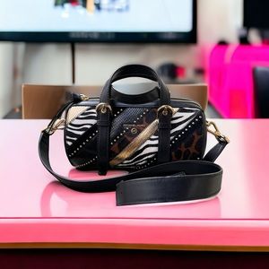 Michael Kors Stanton barrel crossbody duffle bag animal print